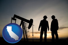california map icon and an oil well and two oil workers at dusk
