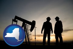 new-york map icon and an oil well and two oil workers at dusk